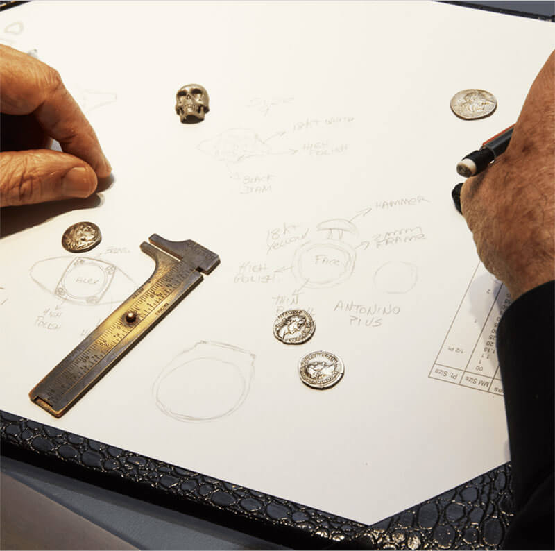 Jorge Adeler sketching a design of a custom jewelry piece
