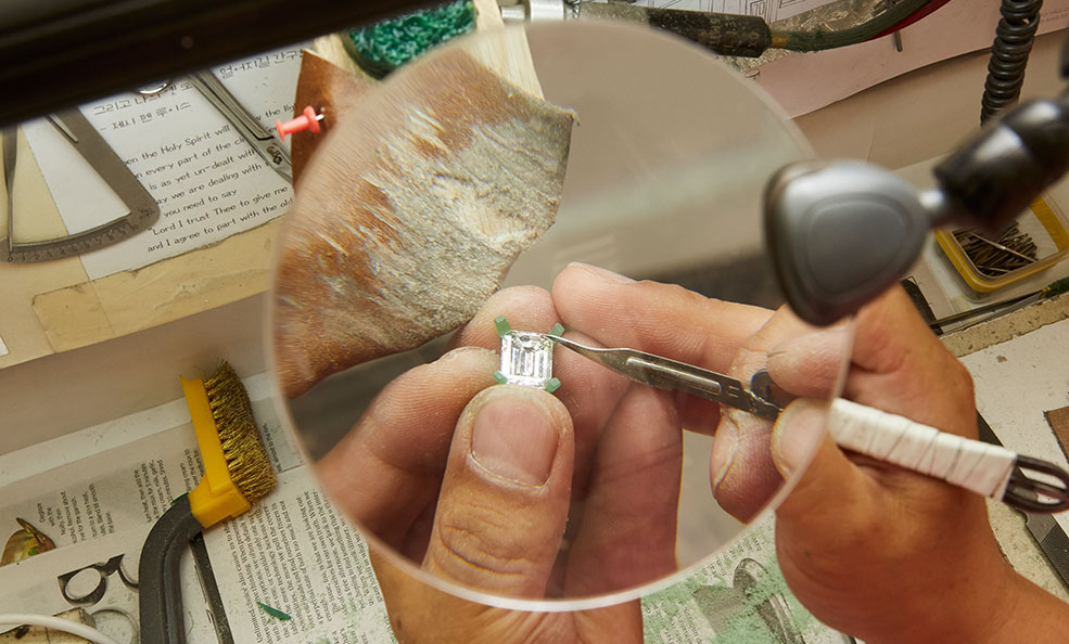 crafting an engagement ring in a workshop